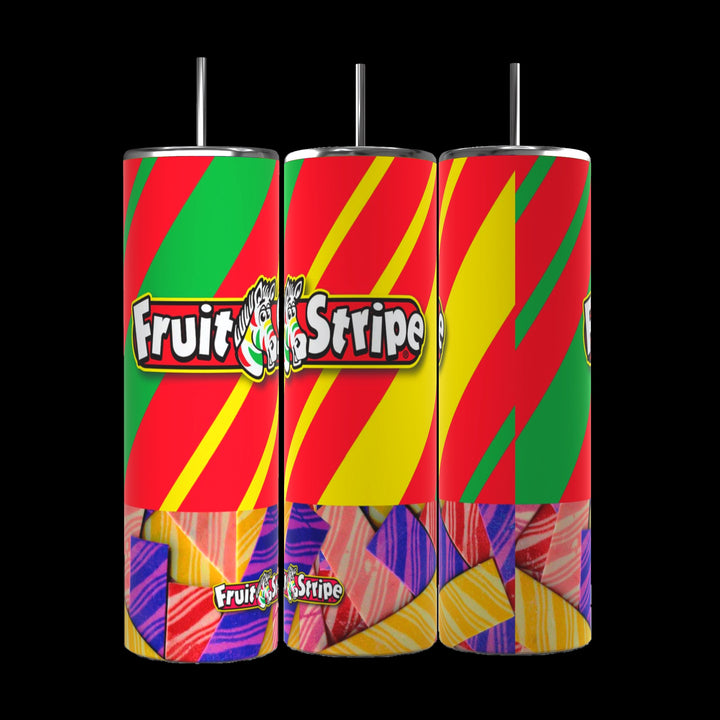 Three vibrant Fruit Stripe Gum 20oz Stainless Steel Tumblers by Kreative Kreationz, each adorned with red, yellow, and green diagonal stripes. The center tumbler prominently features a logo with "Fruit Stripe" text alongside an image of a zebra. The bottom part of each tumbler showcases multicolored gum pieces. Set against a black background, these sleek tumblers are perfect for any occasion.