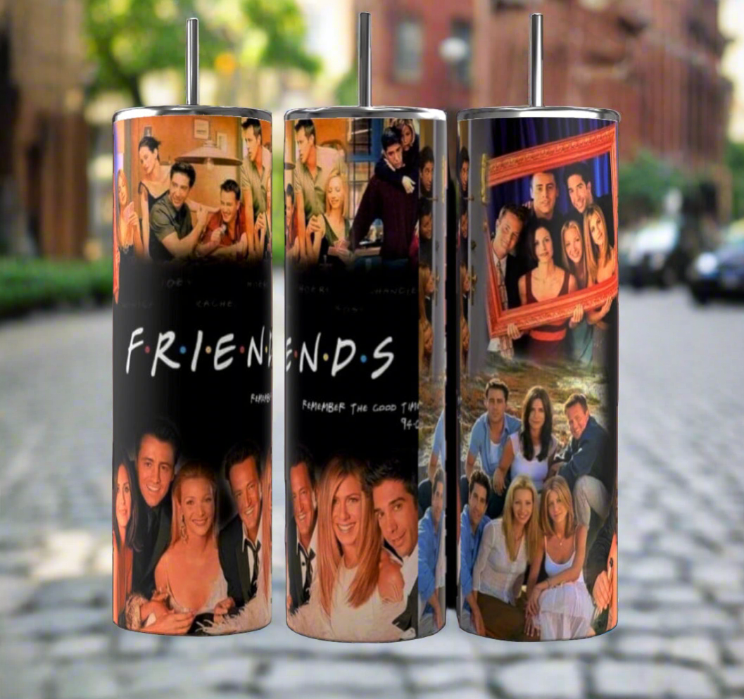 The Friends TV Show Collage 20oz Tumblers by Kreative Kreationz, an ideal gift for any 90s sitcom fan, are showcased on a cobblestone street. Each tumbler features iconic scenes and beloved characters from the show, brought to life with vibrant colors and memorable ensemble moments. Additionally, they are designed with double-wall insulation to ensure your drinks stay at the perfect temperature.