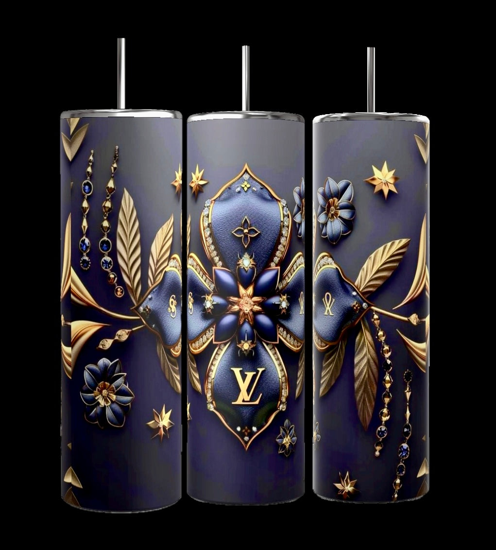 Three tumbler cups with dark blue backgrounds adorned with intricate gold and dark blue floral designs and leaves. The center tumbler, a 3D Design LV 20oz Skinny Tumbler by Kreative Kreationz, features a prominent "LV" logo near the base. These double-wall stainless steel tumblers exude a touch of luxury reminiscent of Dooney and Bourke craftsmanship.