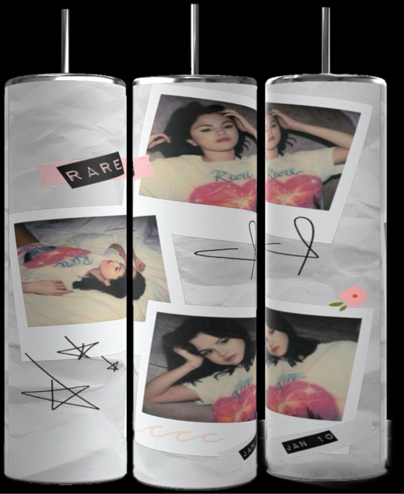 Three tall tumblers are decorated with images of Selena Gomez in different poses; one in a white dress, one with a serious expression, and one in casual attire. The designs, reminiscent of intricate Stanley cups, are embellished with flowers, leaves, hearts, and text like "Rare," "Trust," "same old love,” and "you left me in pieces.