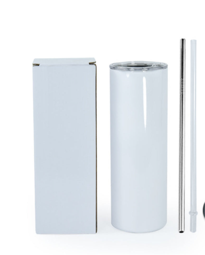 A tall, sleek Kreative Kreationz Crush Orange Soda 20oz Skinny Tumbler with a spill-proof clear lid stands next to its box. Two reusable straws, one metal and one clear plastic, accompany the tumbler.