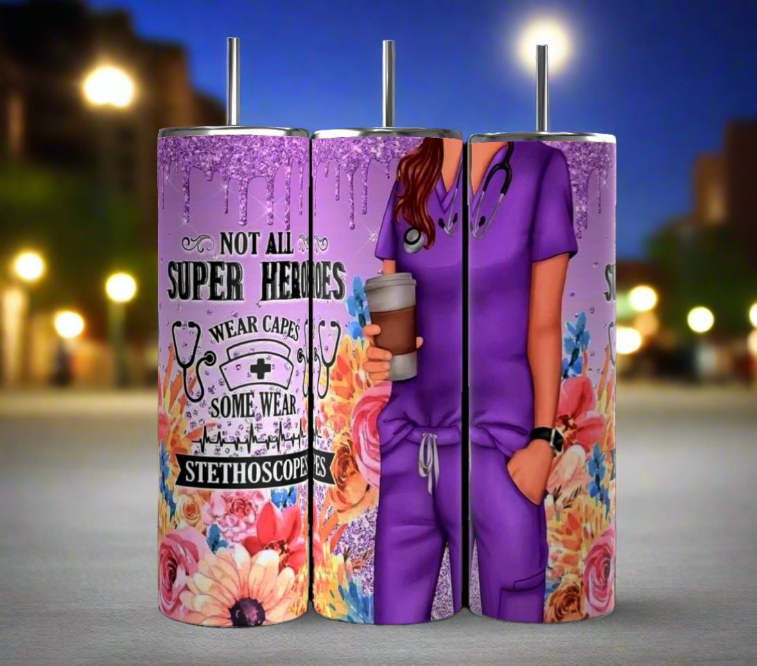 The "Not All Superheros Wear Capes Nurse Edition 20oz Tumbler" by Kreative Kreationz features a vibrant purple design showcasing a detailed illustration of a healthcare professional in scrubs holding a stethoscope. The tumbler is adorned with the inspiring text, "Not all superheroes wear capes, some wear stethoscopes," surrounded by beautiful floral patterns and shimmering glitter effects. Built to last, its durable construction ensures longevity.