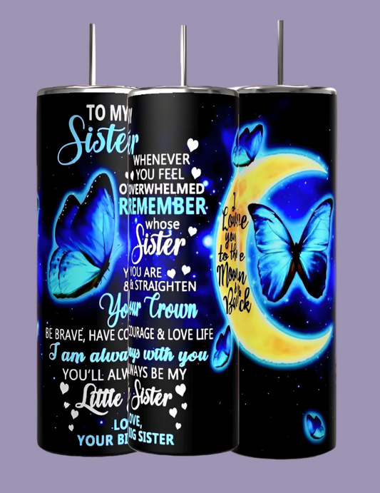 Three robust "Sister 20oz Tumblers" by Kreative Kreationz showcase charming blue butterfly and moon motifs. Adorned with heartfelt inscriptions such as "To my sister... I'm always with you" and "Love you to the moon and back," these designs are elegantly highlighted with hearts against a purple backdrop. Each tumbler is equipped with a spill-proof lid for added convenience.