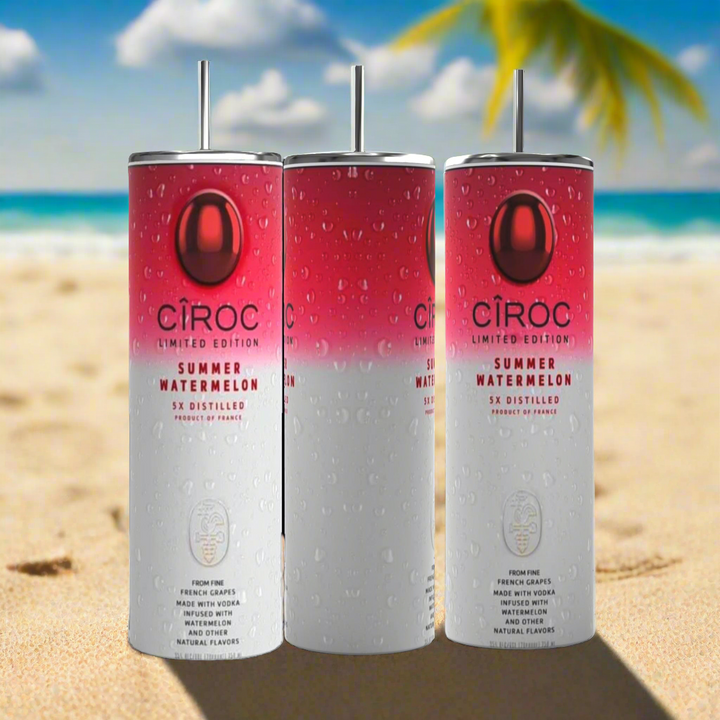 Two cans of Kreative Kreationz Ciroc 20oz Tumbler with 3D Lid Topper are shown on a wooden surface, reminiscent of travel tumblers. The left can is Red Berry flavor, topped with ice and a cherry. The right can is Vodka Snap Frost flavor, topped with ice and a lemon slice. Both cans feature product information and branding.