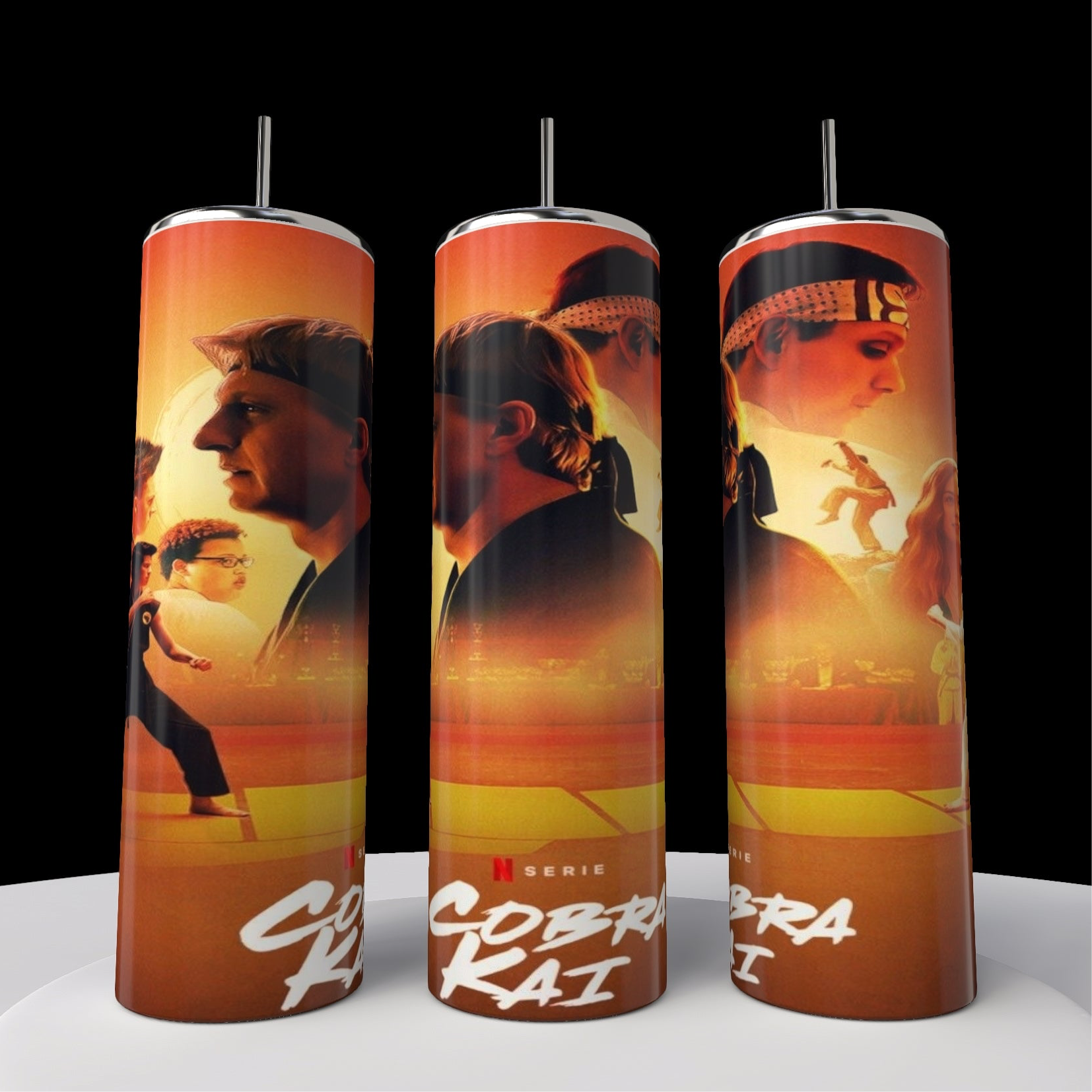 Three Kreative Kreationz stainless steel tumblers, each 20oz, showcase vibrant "Kobra Kai" artwork with martial artists and characters against a fiery orange backdrop—ideal for fans of the iconic show.