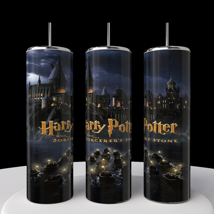 Three Kreative Kreationz Harry Potter 20oz tumblers depict a "Sorcerer's Stone" nighttime scene with Hogwarts lit up and lanterns afloat. Each includes a reusable straw, perfect for magical side-by-side displays.