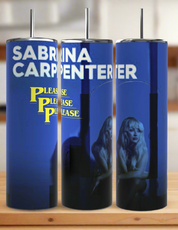 Image shows three views of the "Please Please Please - Sabrina Carpenter 20oz Skinny Tumbler" by Kreative Kreationz, featuring a spill-proof lid and reusable straw. The design showcases the text "SABRINA CARPENTER" and "PLEASE PLEASE PLEASE," accompanied by an image of a woman with long hair sitting against a blue background.