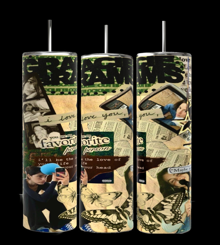 Three cylindrical objects, possibly Gracie Abrams 20oz Skinny Tumblers from Kreative Kreationz, are adorned in a collage of images and text. The design features butterflies, a couple reading, and phrases such as "you are my favorite person" and "I love you." The background includes snippets of handwritten notes and photographs, highlighting the tumblers' durable construction.