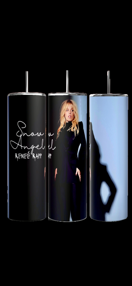 The Kreative Kreationz "Renee Rapp 20oz Tumbler" set includes three cylindrical tumblers adorned with an image of a person with long blonde hair in a dark outfit. The left tumbler is inscribed with "Snow Angel Renée Rapp" in elegant white cursive text. These durable tumblers, which each have a 20 oz capacity, feature waist-up images against a blue background.