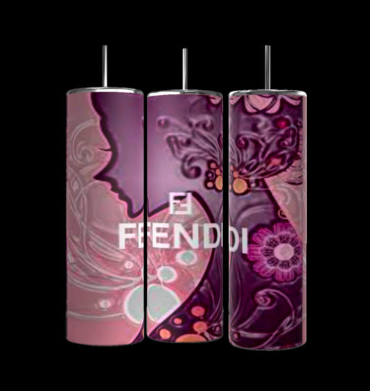 A set of three tall, slender "FENDI Marble 20oz Skinny Tumblers" by Kreative Kreationz, showcasing patterned designs in shades of purple, pink, and white. The middle tumbler prominently features the word "FIENDI" on the front. Each stainless steel tumbler includes a black straw and features double-wall insulation to maintain optimal drink temperature.