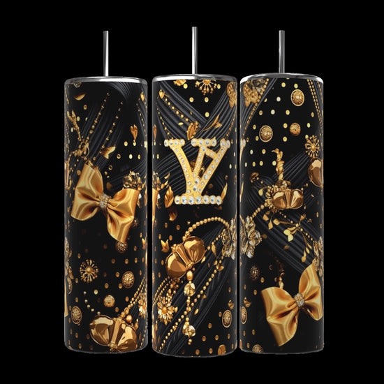 Three Louis Vuitton Black & Gold 20oz Tumblers by Kreative Kreationz showcase elegant gold bows, intricate patterns, and a central LV monogram. This luxurious and festive design is set against a robust black background.