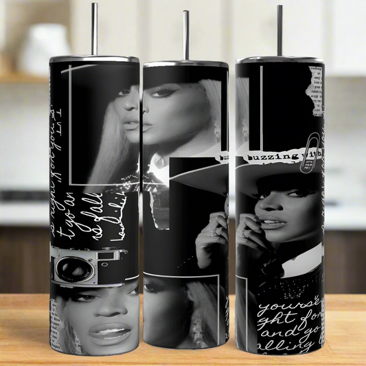 Three tall, cylindrical stainless steel tumblers, the Beyonce 20oz by Kreative Kreationz, feature black and white fashion-themed designs with a woman's face in various poses. Each tumbler is intricately sublimated with text and artistic graphics like a camera, elegantly resting on a wooden surface.