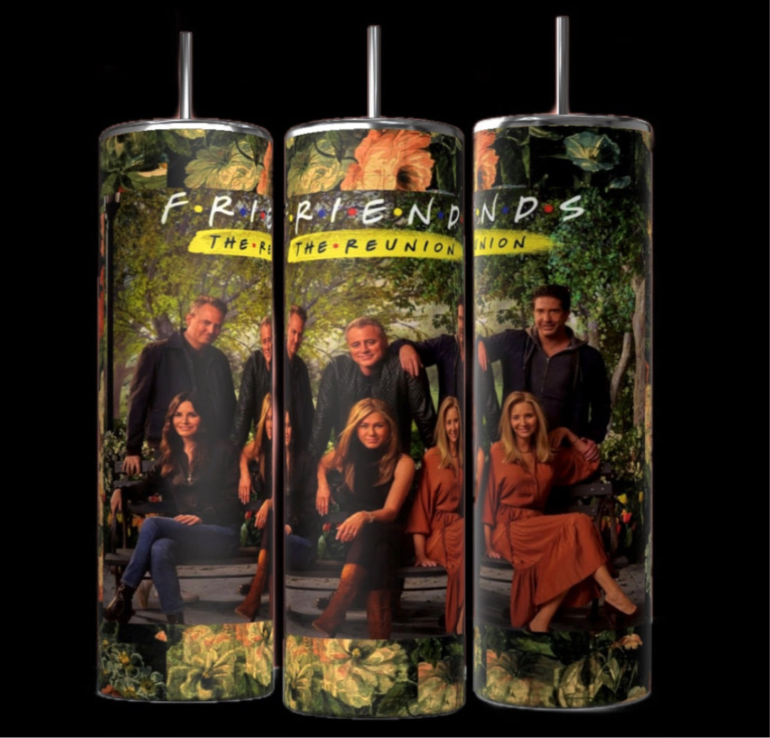 Three cylindrical tumblers are displayed against a black background. Each Kreative Kreationz The Reunion Friends TV Show 20oz Tumbler features an image of a group of people sitting and standing in front of a lush, green background with the text "F.R.I.E.N.D.S The Reunion" at the top, complete with double-wall insulation and a reusable straw.