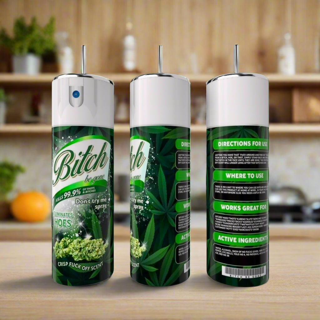 Three "Hater Be Gone Spray 20oz Tumbler" cans from Kreative Kreationz, with cannabis-themed labels showing uses, ingredients, and instructions over green leaves, sit on a wooden kitchen counter. Blurred kitchen shelves are visible in the background.