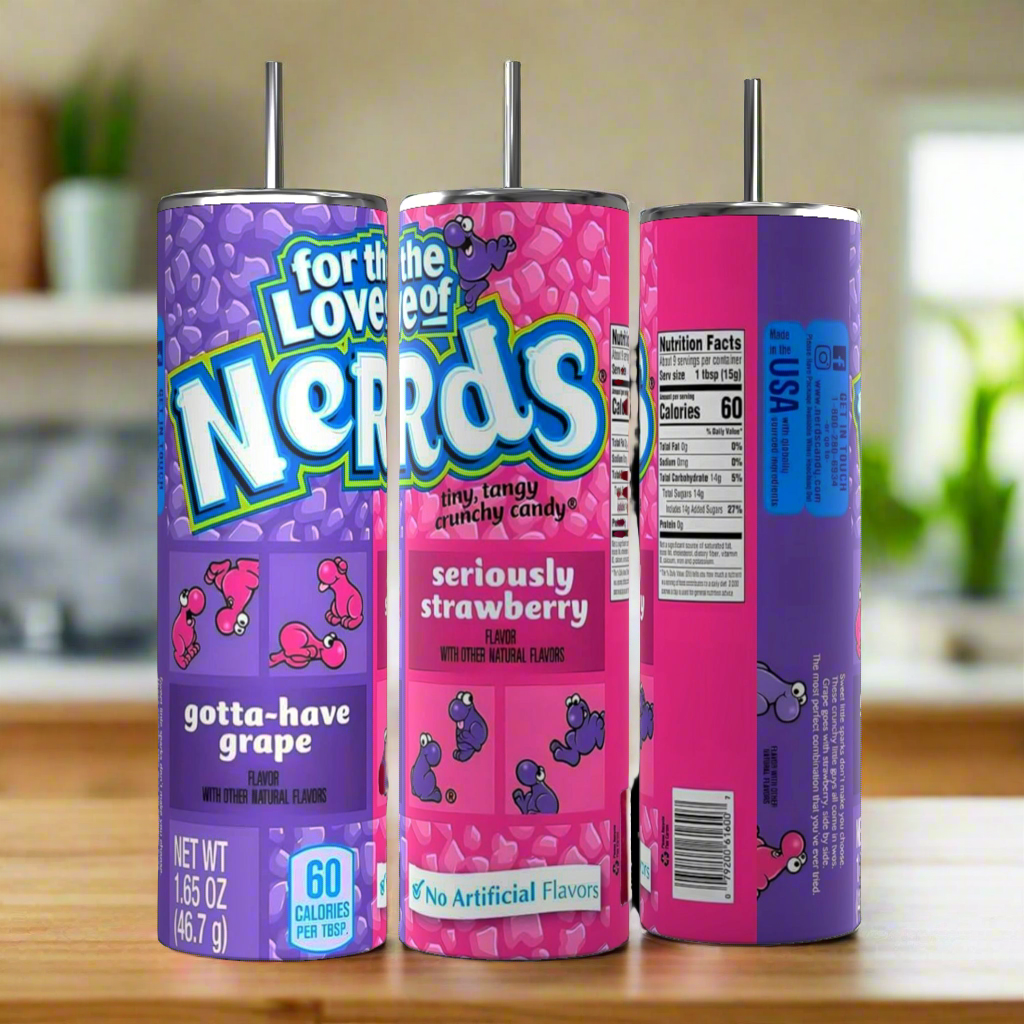 Three cylindrical containers of Nerds-flavored powder drink mix, each topped with black straws. The front container displays "For the Love of Nerds" in grape flavor, while the middle one features strawberry flavor. Each boasts a Kreative Kreationz Nerds 20oz Skinny Stainless Steel Tumbler with a spill-proof lid. Nutrition facts and ingredients are visible on the back container.