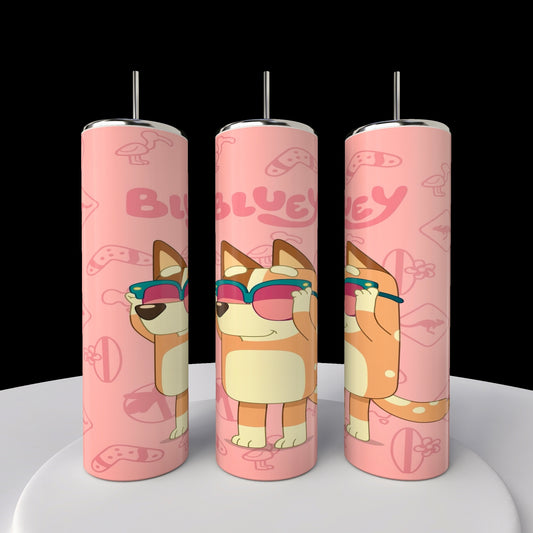 Three pink cylindrical Bluey tumblers featuring a cartoon dog in sunglasses, game controllers, and "BLUEY" in playful font. Made from durable stainless steel by Kreative Kreationz, these 20oz sublimated tumblers with straws are perfect for kids and gaming enthusiasts.