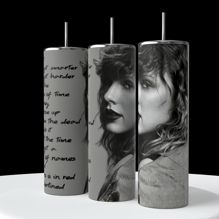 Three tall cylindrical objects with black lids. The Taylor Swift Rep 20oz Tumbler on the left, by Kreative Kreationz, features handwritten text, while the middle and right tumblers display grayscale images of a woman with curly hair and intense expressions, dressed in casual attire. The background is black.