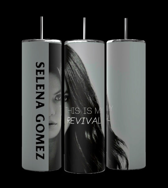 Three tall, cylindrical personalized tumblers are shown. the wrapped tumbler features the name 