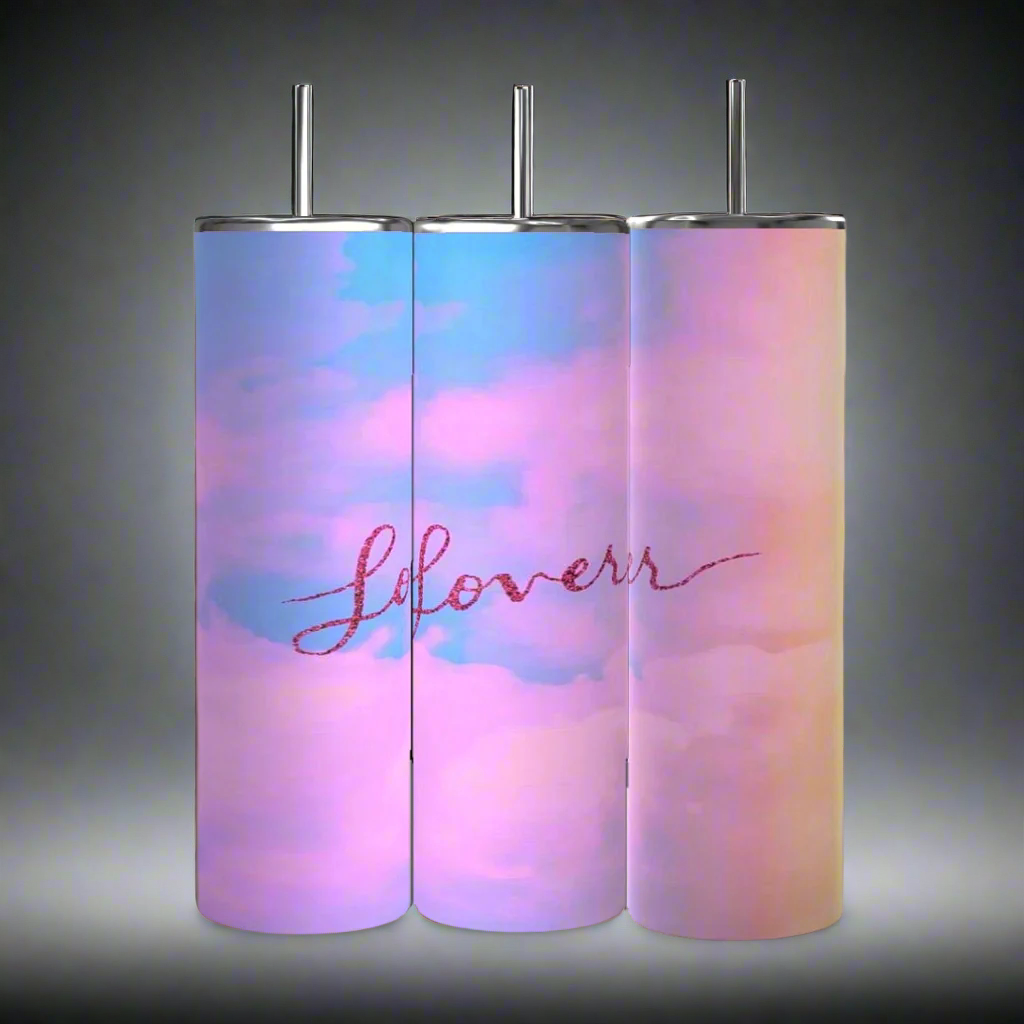 The Lover 20oz Tumblers by Kreative Kreationz come in a set of three, featuring a pastel pink and blue gradient with "Slovery" in red on the insulated tumbler. These stainless steel skinny tumblers with straws rest against a soft, neutral backdrop.