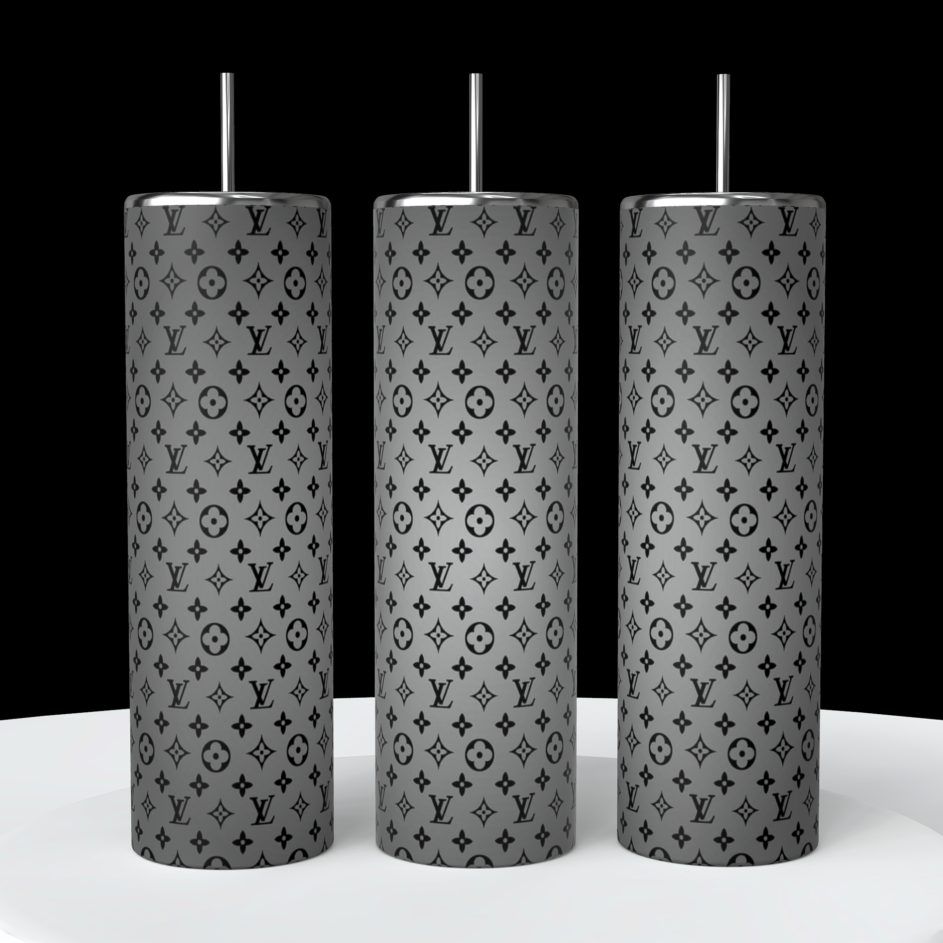 The LV Ombre 20oz Skinny Tumblers from Kreative Kreationz feature a black and gray monogram pattern on a white backdrop set against a black background. Each double-wall stainless steel tumbler is equipped with a straw, offering both style and functionality.