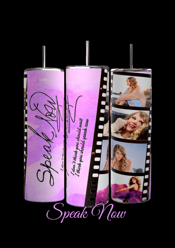 Image of seven cylindrical tumblers, each adorned with collage designs representing different Taylor Swift music albums. These Taylor Swift ERAS 20oz Tumblers by Kreative Kreationz are labeled "Debut," "Speak Now," "1989," "Lover," "RED," and twice as "Reputation." Each durable drinkware piece showcases photos and thematic elements from the corresponding album.