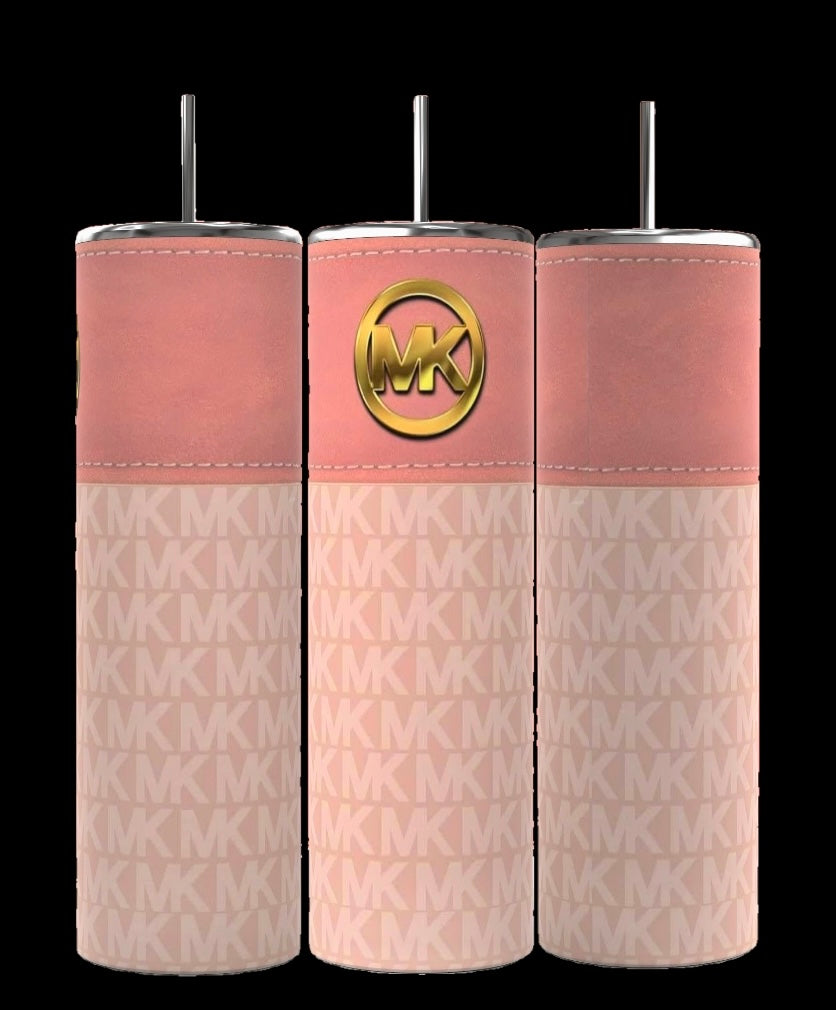 The Michael Kors Purse | Pink 20oz Tumblers by Kreative Kreationz feature a sleek design with a pink and beige color scheme, accented by a repeating "MK" pattern that reflects Michael Kors' signature style. Each tumbler is crafted with care, including a metallic lid and straw for added convenience.