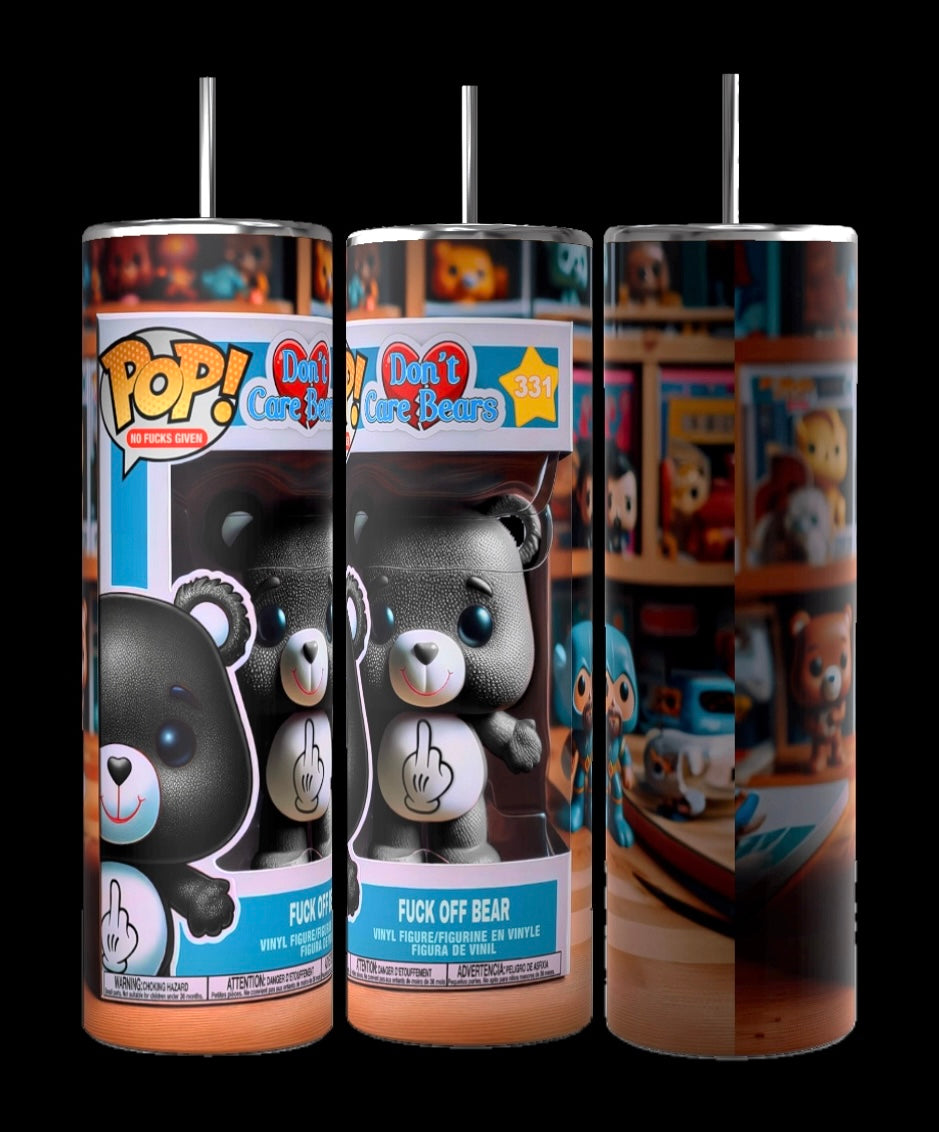 Three tall cylinders showing a 20 ounce skinny Tumblr from all sides with a 360° angle. The image shows the brand “POP” with gray colored teddy bear stating part of a don’t give a fuck bear collection image shows bear in a “POP” box on the bare stomach is an image of the middle finger