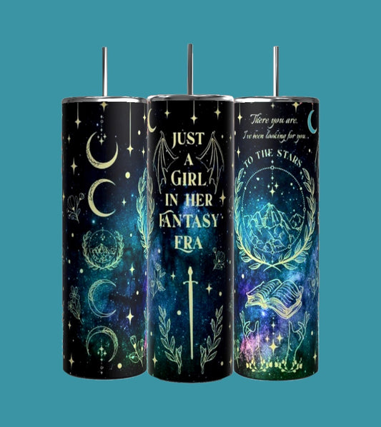 The trio of tall tumblers from Kreative Kreationz features a durable build and spill-proof lids, each adorned with a unique fantasy-themed design. One showcases celestial patterns with crescent moons, another carries the phrase "Just a girl in her fantasy" alongside mystical symbols, and the third is a 20oz creation depicting mountains with a motivational quote about reaching for the stars.