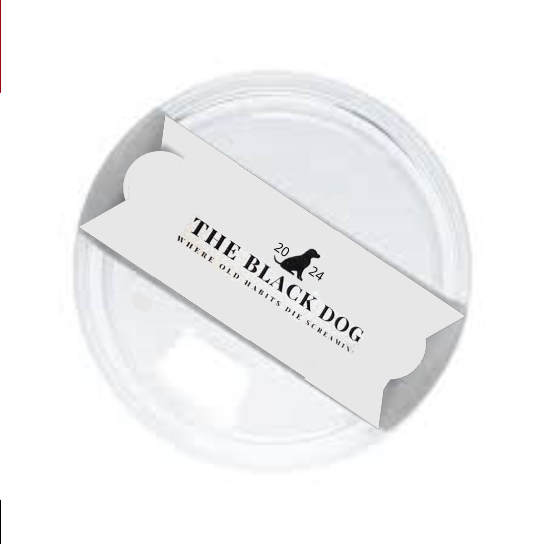 The "TTPD Black Dog Stanley Lid Plate/Topper" by Kreative Kreationz is a white, round container lid with a grey ticket on top, featuring a black dog silhouette and the text "2044 THE BLACK DOG WHERE OLD HABITS DIE YARDLEY".