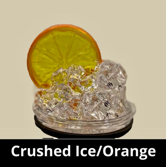 A slice of lime sits atop a pile of crushed ice, elegantly displayed on a small, round, clear platform against a beige background that accentuates the lime and ice. A black strip at the bottom features white text reading 