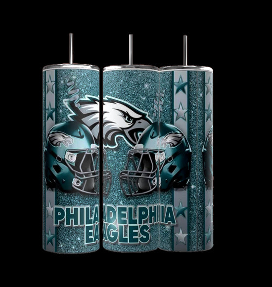 The Eagles 20oz Skinny Tumbler from Kreative Kreationz, part of the NFL Collection, showcases Philadelphia Eagles logos and helmets on a glittery teal backdrop with stars. Each includes a straw and beautifully captures the team's iconic colors.