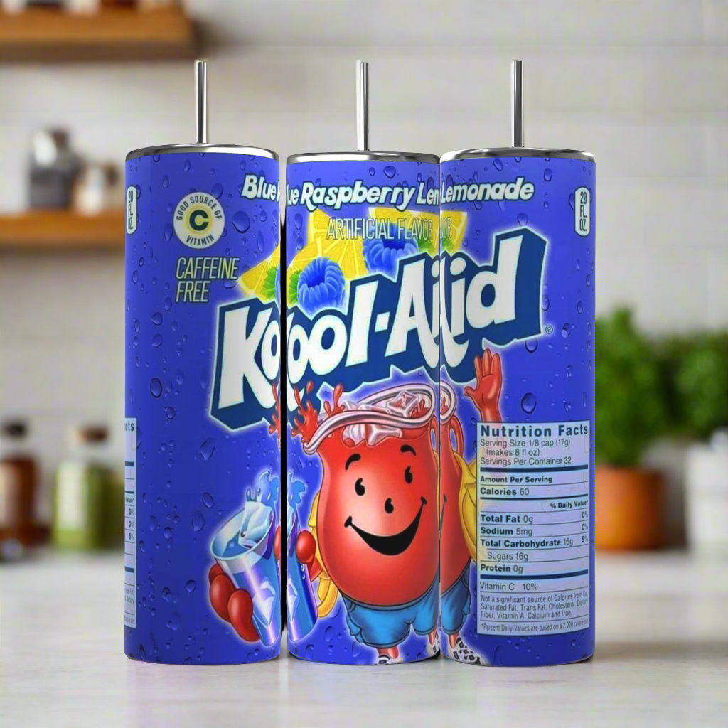 Three cans of Kool-Aid Blue Raspberry Lemonade are arranged in a row on a kitchen counter. The label features a cartoon Kool-Aid Man holding a pitcher. Each can states "Caffeine Free" and displays nutrition facts. Nearby sits a Kreative Kreationz's Kool Aif 20 ounce skinny tumbler with a spill-proof lid, perfect for keeping your beverages hot or cold.