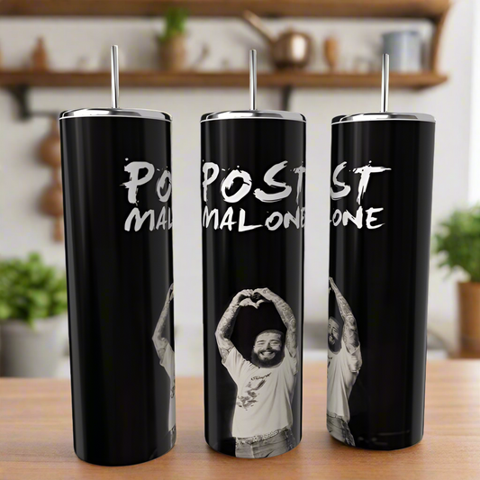 Three luxury-inspired Posty Tumblers, tall and black with metal straws, feature a person in a white shirt doing a heart gesture. "POST MALONE" is in stylized white lettering. These high-quality stainless steel tumblers from Kreative Kreationz stand against a blurred kitchen backdrop.