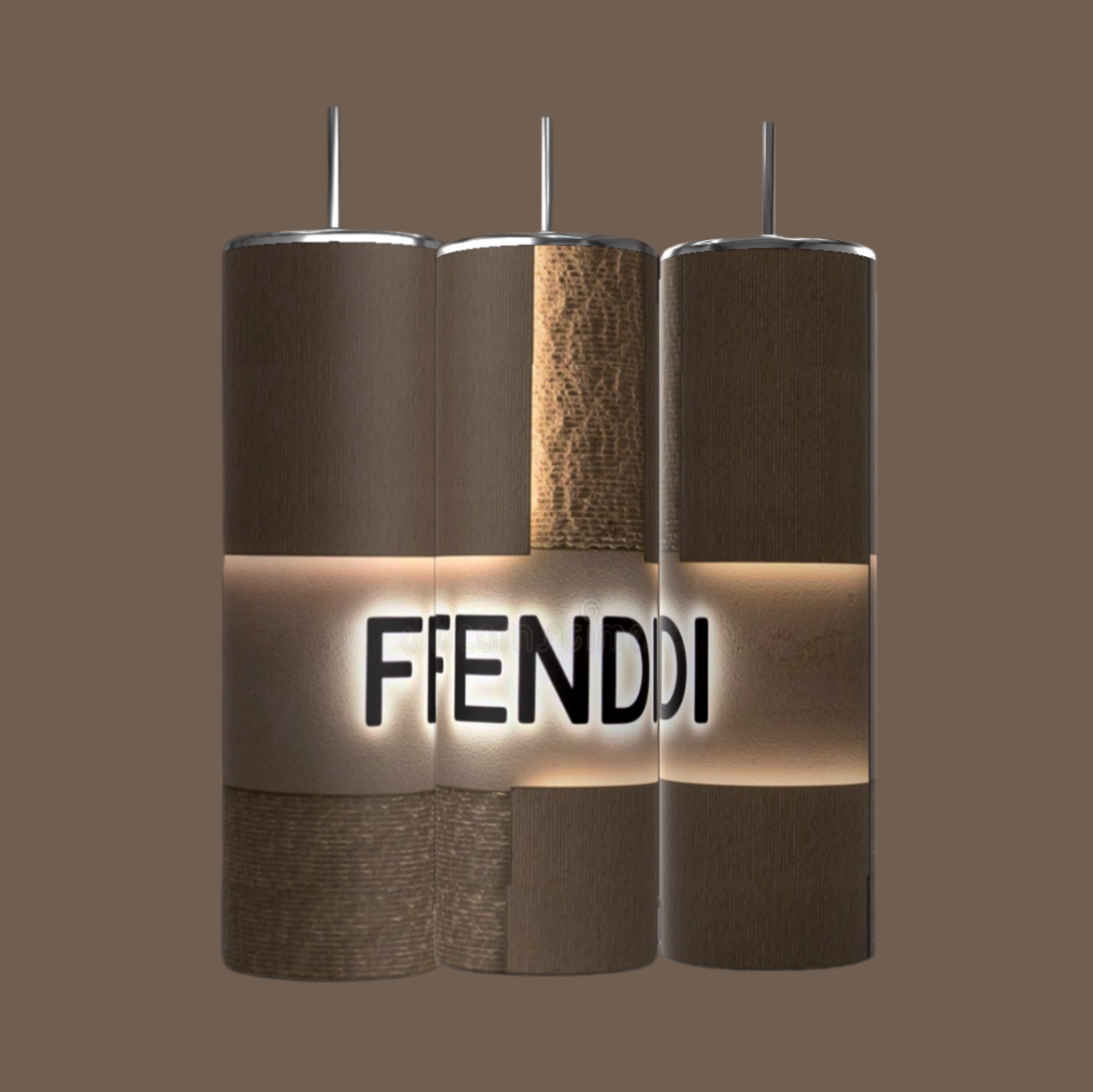 Three cylindrical, brown pendant lights are vertically suspended against a neutral brown background. The lights, made of a textured material, feature a glowing band in the center with large, dark letters spelling "FFENDI," reminiscent of the sleek design found on a 20oz FEND 20oz Skinny Tumbler by Kreative Kreationz.