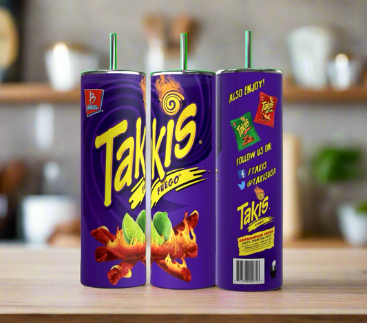 Image of three cylindrical cups with metal straws, designed to resemble Takis Fuego snack packaging. The Takis 20oz Stainless Steel Skinny Tumblers from Kreative Kreationz display the Takis logo, fiery snack sticks, and lime slices on a purple background. With a 20 oz capacity, they keep beverages hot or cold. Blurred kitchen background.