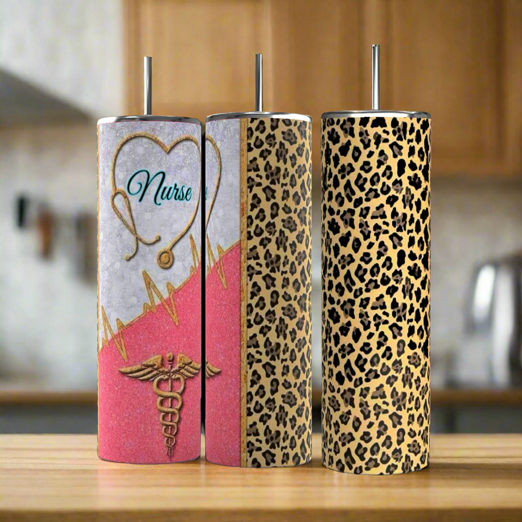 Three stainless steel tumblers are shown. The first has a nurse-themed design with a stethoscope and caduceus symbol. The second, the Nurse Leopard Print 20oz Skinny Tumbler from Kreative Kreationz, boasts pink and gold colors with an EKG line. The third features a gold and black leopard print pattern, all with spill-proof lids.