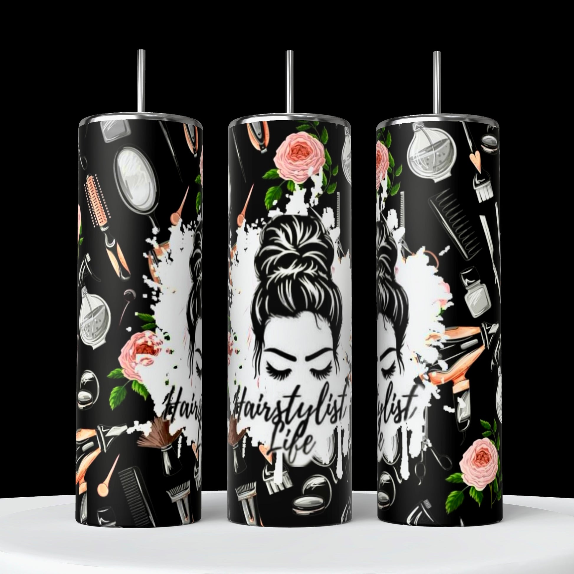 Kreative Kreationz's Hairstylist 20oz Tumblers showcase graphics of hairstyling tools, pink flowers, and "Hairstylist Life" encircling a bun-haired illustration. Built to last with vibrant paint splatter backgrounds, these black tumblers celebrate the artistry of hairstylists.