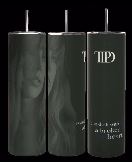 Three gray TTPD Lyrics 20oz Tumblers by Kreative Kreationz are displayed, each showcasing a black and white illustration of a thoughtful woman with long hair. Overlaid on the image is the text 