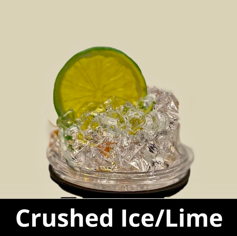 A slice of lime sits atop a pile of crushed ice, elegantly displayed on a small, round, clear platform against a beige background that accentuates the lime and ice. A black strip at the bottom features white text reading "3D Lid Topper for standard 20oz Tumbler." This setup by Kreative Kreationz is an ideal accessory for any tumbler.