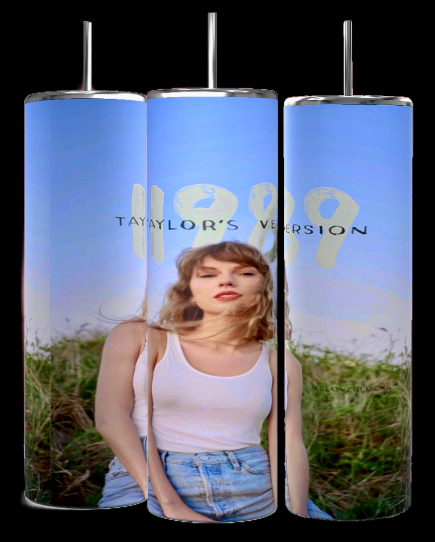 Three 1989 Series | Taylor Swift 20oz Tumblers by Kreative Kreationz are shown, each featuring an image of a woman with long hair holding her head and looking to the side. Text on the tumblers reads "1989 Taylor's Version". The background is a clear sky with warm, golden light.