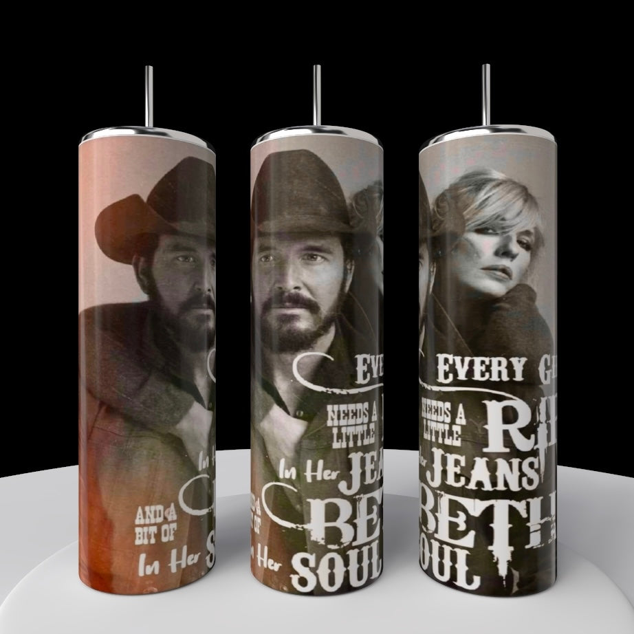 Three Kreative Kreationz Yellowstone 20oz stainless steel tumblers display a cowboy hat-wearing man and a woman, with the phrase, "Every girl needs a little Rip in her jeans and a bit of Beth in her soul." They are stylishly placed on a white circular stand against a black background.