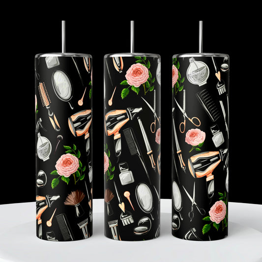 Kreative Kreationz's Hairstylist 20oz Tumblers feature black backgrounds adorned with styling tools like hairdryers, brushes, scissors, mirrors, and pink roses. Each tumbler includes a reusable silver straw and a spill-proof lid for style and convenience.