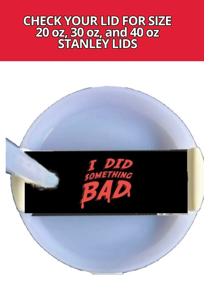 A Stanley Plate/Topper from Kreative Kreationz's REPUTATION collection features a black rectangular card on a round white plate. The card boldly displays the text "I DID SOMETHING BAD" in red letters, with a small part of the chic design visible against the white background.