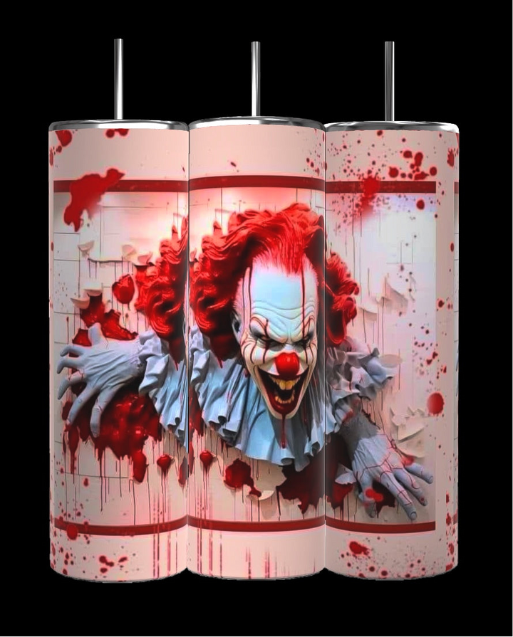 A set of three 20 oz tumblers from the Kreative Kreationz IT Halloween Series features a menacing clown with red hair and face paint, emerging through a blood-spattered background. The design shows the clown tearing through a white textured surface, enhancing the horror theme. Each tumbler includes a spill-proof lid.