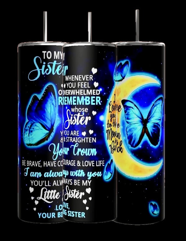 Kreative Kreationz's Sister 20oz Tumbler features intricate designs, showcasing blue butterflies, a crescent moon, and heartfelt messages such as "You are my sister" and "Love you to the moon and back." Combining durability with spill-proof lids, it is crafted to be both beautiful and practical.