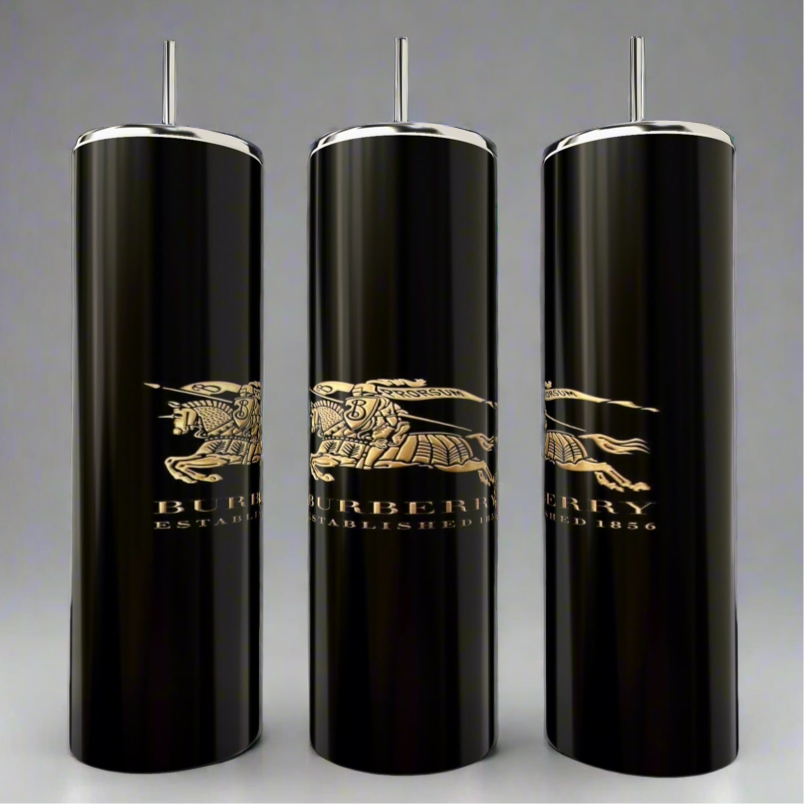 Three sleek black Burberry 20oz Skinny Tumblers from Kreative Kreationz feature silver tops and reusable straws, boasting a golden knight on horseback logo with "BURBERRY" and "ESTABLISHED 1856." The double-wall insulation keeps drinks at the perfect temperature.