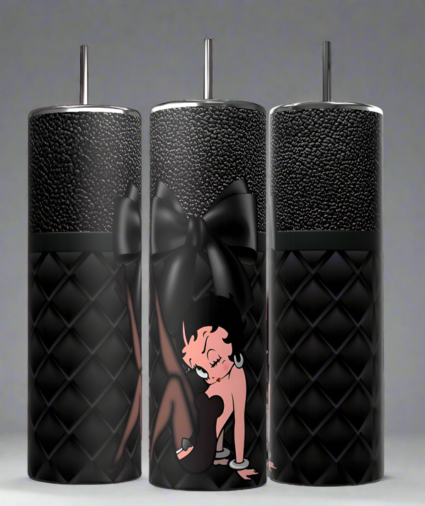 Three Betty 20oz Skinny Tumblers by Kreative Kreationz, featuring a cartoon character and a large black bow design, come with black quilted surfaces, spill-proof lids, and metal straws. They are showcased side by side against a neutral background.