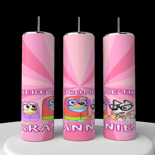 Three "Bluey Grannies" pink 20oz tumblers by Kreative Kreationz are showcased side by side, each adorned with charming cartoon animals and partial text "HERE COME THE GRANNIES" in colorful letters. The sturdy design features a radial pattern in various shades of pink.