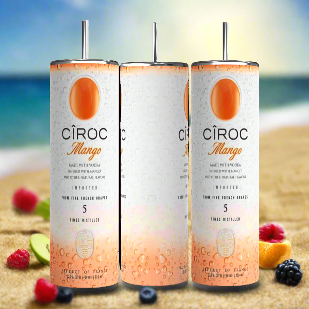 Two cans of Kreative Kreationz Ciroc 20oz Tumbler with 3D Lid Topper are shown on a wooden surface, reminiscent of travel tumblers. The left can is Red Berry flavor, topped with ice and a cherry. The right can is Vodka Snap Frost flavor, topped with ice and a lemon slice. Both cans feature product information and branding.