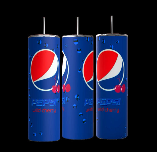 Three slim stainless steel tumblers, branded with the Kreative Kreationz logo and featuring the iconic Pepsi Wild Cherry design on a blue background. The tumblers display images of red cherries and water droplets to evoke a sense of refreshment. With a 20 oz capacity and double-wall insulation, these chic Cherry Pepsi tumblers are perfect for keeping your drink perfectly chilled on any occasion.